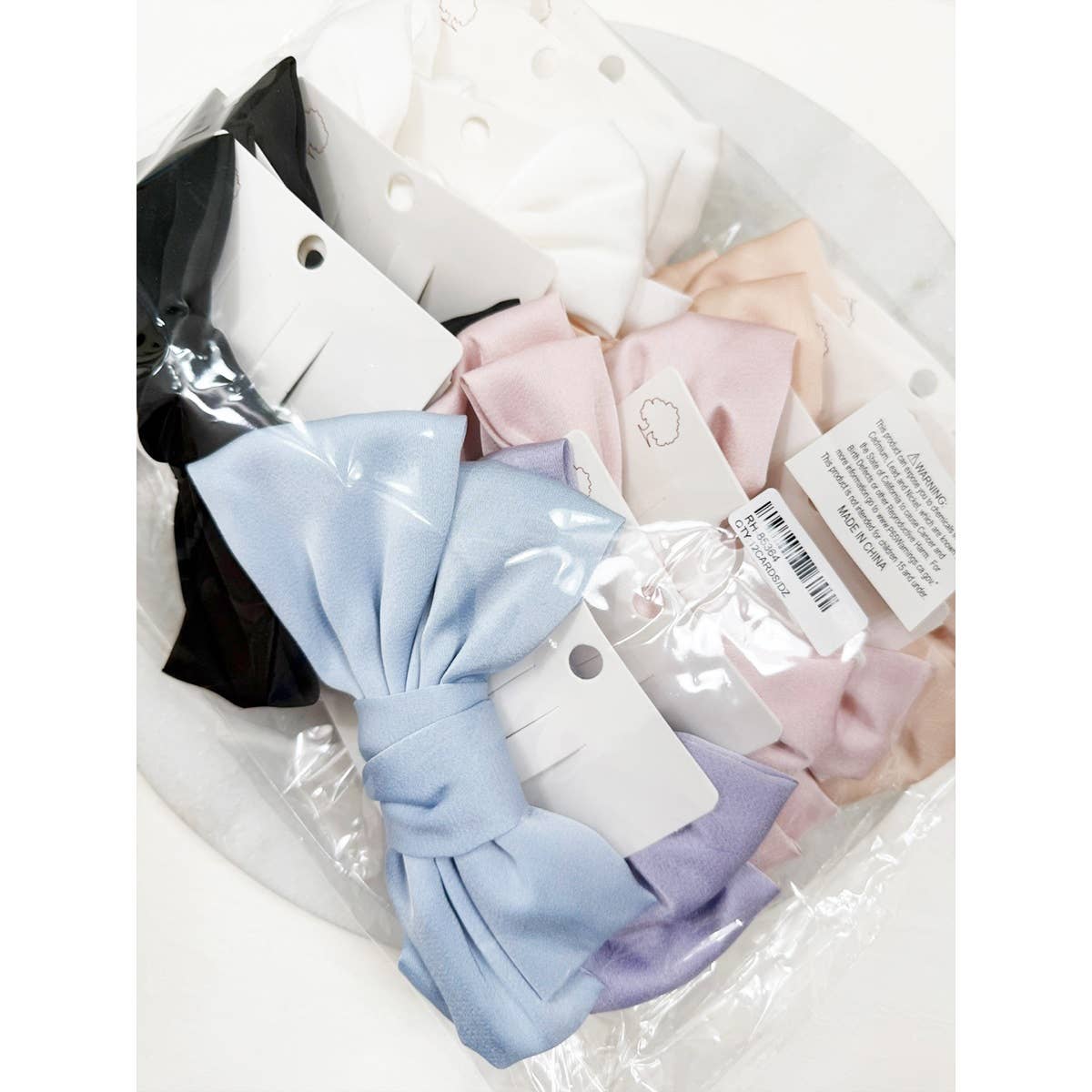 Double Layer Soft Tone Satin Bow Hair Clips boutique style from Ivy & Grace womens boutique