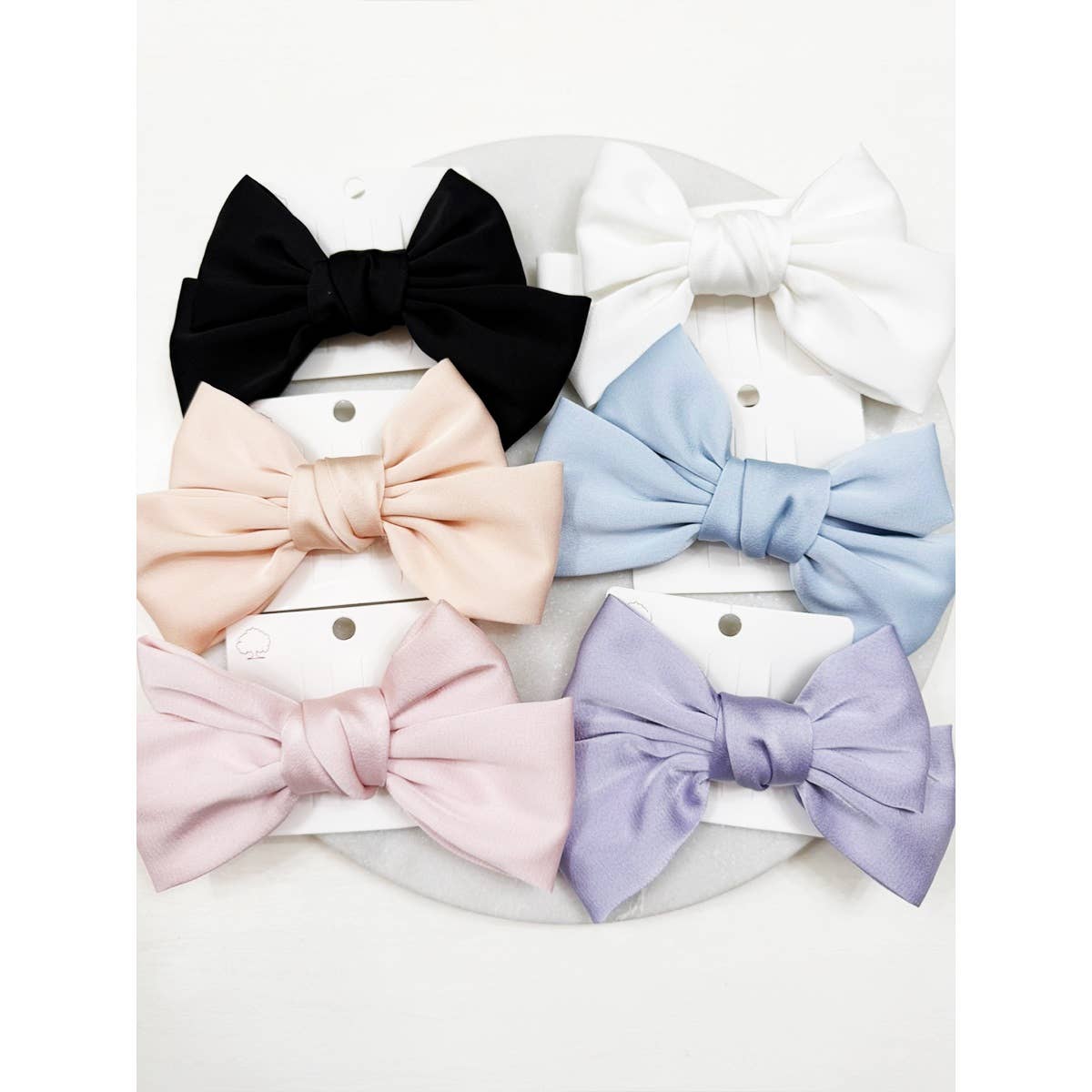 Double Layer Soft Tone Satin Bow Hair Clips boutique style from Ivy & Grace womens boutique